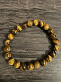 Bracelet Œil de Tigre naturel composé de 23 pierres rondes de 8 mm, bijou ésotérique de protection, courage et confiance.