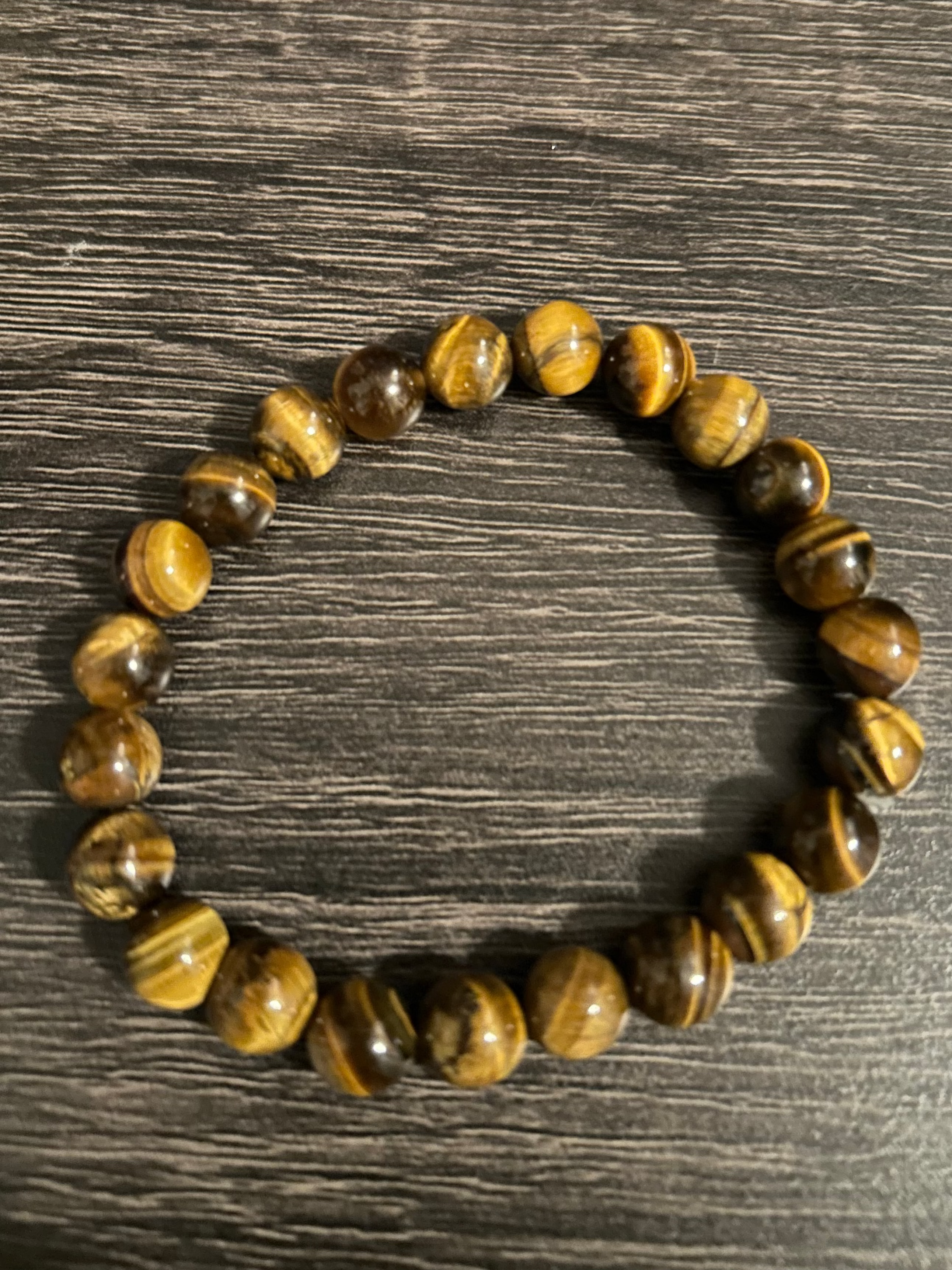 Bracelet Œil de Tigre naturel composé de 23 pierres rondes de 8 mm, bijou ésotérique de protection, courage et confiance.